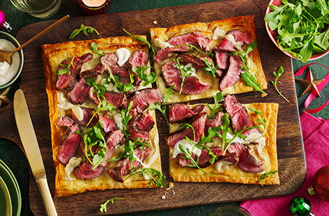 Top puff pastry with crème fraîche and tender fillet steak to make this simple, gluten-free tart. Finish with some rocket and a drizzle of horseradish for a brilliant Boxing Day dinner.