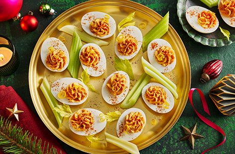 Loaded with tomato purée, hot sauce and garnished with celery, these simple devilled eggs are inspired by the flavours of a classic bloody Mary cocktail. Serve them up at your Christmas party to show you're the host with the most.