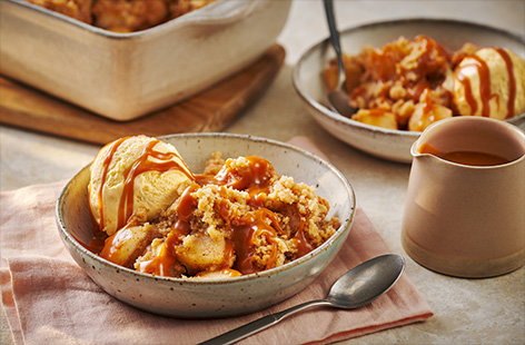Give classic apple crumble a glow-up with a drizzle of caramel sauce. We've added a spoonful of miso paste to the caramel for deep and rich flavours. Serve alongside a scoop of vanilla ice cream and enjoy.