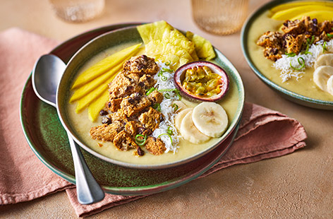 Brighten your day with this smoothie bowl of whizzed up tropical fruits, fresh ginger and lime
