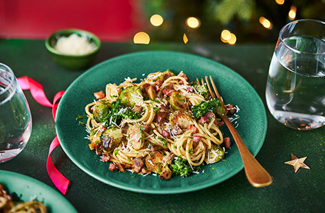 Crispy caramelised sprouts add a sweet crunch and festive twist to this carbonara.