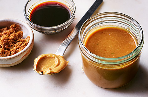Try something new with these tasty peanut butter recipes for bakes, satay stir-fries and more.