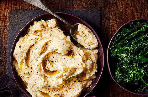 Whip up this luxurious truffle mash without having to buy a bottle of truffle oil. Maris Piper potatoes give the best result here – light and fluffy with a floury texture that absorbs the butter and milk easily. Serve with bangers, roasts or a hearty pie.