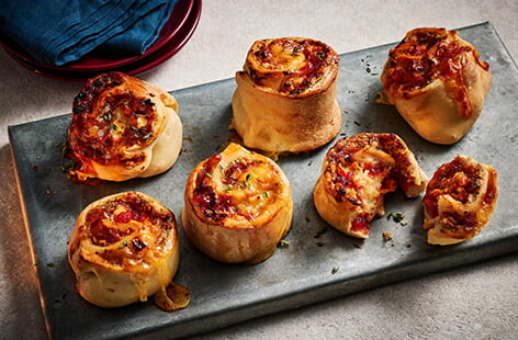 'Here are my soft golden rolls filled with savoury stuffing, tender turkey, melted Brie and sweet chutney – all wrapped in fluffy pizza dough', explains foodie blogger Jade Greenhalgh.