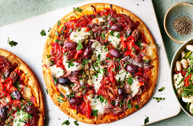 Red pepper and anchovy pizzas