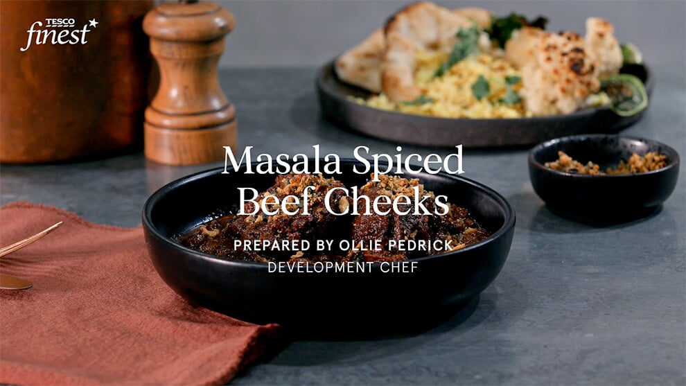 Masala spiced beef cheeks with fiery madras sauce and crispy onion sprinkle