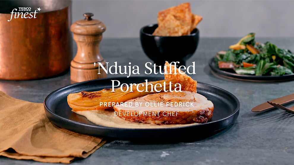 'Nduja stuffed porchetta with smoky garlic butter bean purée and hot honey and orange fennel