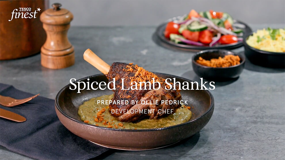 Spiced lamb shanks with green tikka sauce and spiced onion sprinkle