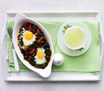 Baked eggs with tomatoes and black kale | Tesco Real Food