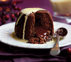 Chocolate puds with Baileys sauce | Tesco Real Food