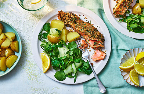 Blitz seeded bread and mix with fresh herbs to make a crunchy breadcrumb topping for salmon. Deliciously simple yet bursting with bright flavours, this is a lovely fast and fresh meal for any night of the week.