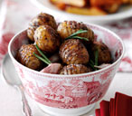 Hasselback potatoes with roasted garlic and rosemary | Tesco Real Food