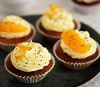 Orange and poppy seed cupcakes with cream cheese frosting | Tesco Real Food
