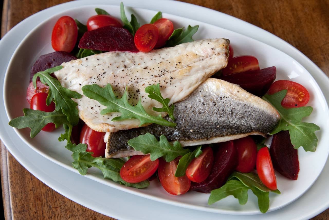 Pan fried fillet of seabass with a fresh salad | Tesco Real Food
