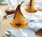 Poached golden pears with chocolate sauce | Tesco Real Food