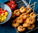Alfred Prasad's prawn skewers with tomato chutney and roast peppers | Tesco Real Food