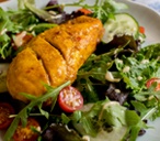 Spicy glazed chicken with a curry salad dressing | Tesco Real Food