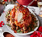 Turkey with maple butter, walnut-cranberry stuffing and juniper gravy | Tesco Real Food