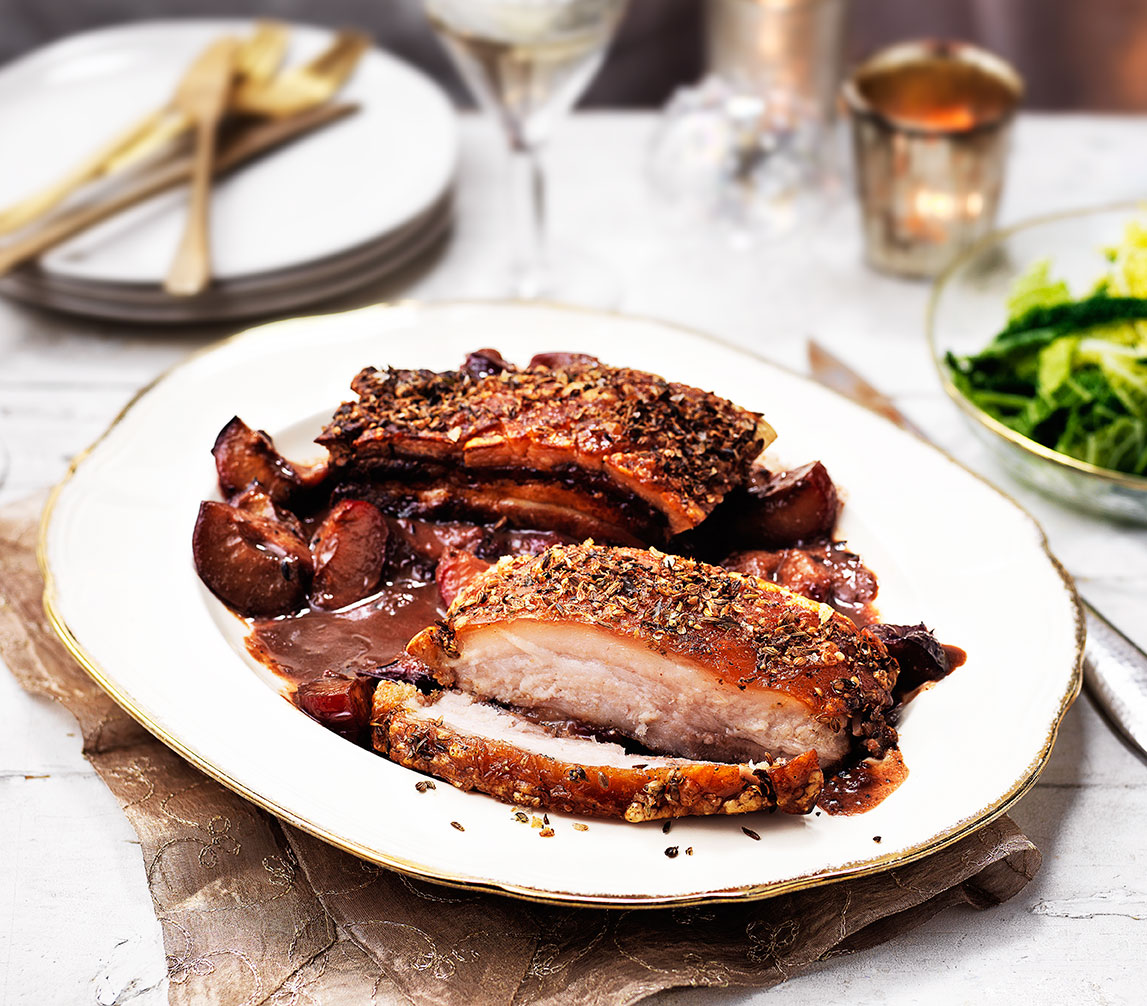 Roast pork belly with sloe gin plums | Tesco Real Food