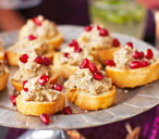 Smoked aubergine caviar crostinis with sesame and pomegranate | Tesco Real Food