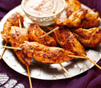 Spanish-style chicken skewers with spicy yogurt dipping sauce | Tesco Real Food