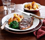 Balsamic steaks with potatoes | Tesco Real Food