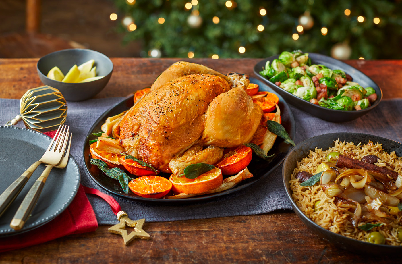 Citrus and herb roast chicken with crispy onion pilaf and charred sprouts recipe