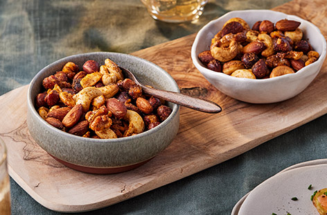 Level up your party snacks with these roasted nuts, gently spiced with ginger and chilli.