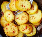 Pan-fried potatoes with dried oregano, garlic and chilli | Tesco Real Food