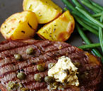Tesco Finest griddled steak with caper butter, green beans and crisp potatoes | Tesco Real Food